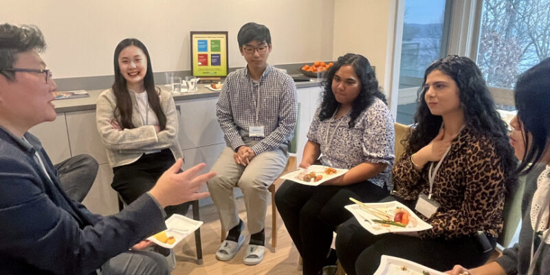 Sun-Joo Jang, MD, PhD, Cardiology Fellow at Yale School of Medicine, engaging with a group of students.